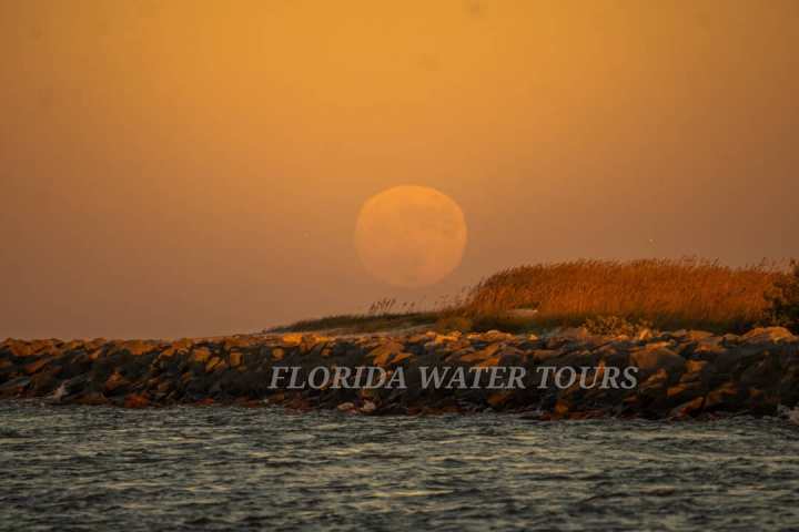 a sunset over a body of water