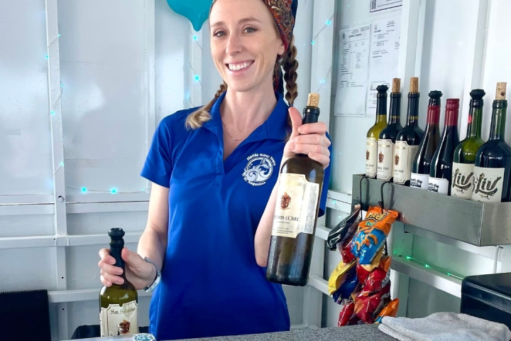 a person holding a bottle