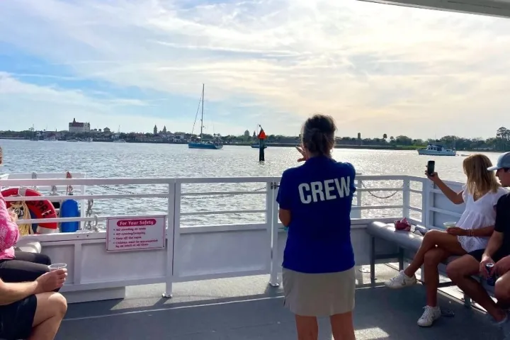 a group of people sitting on a bench