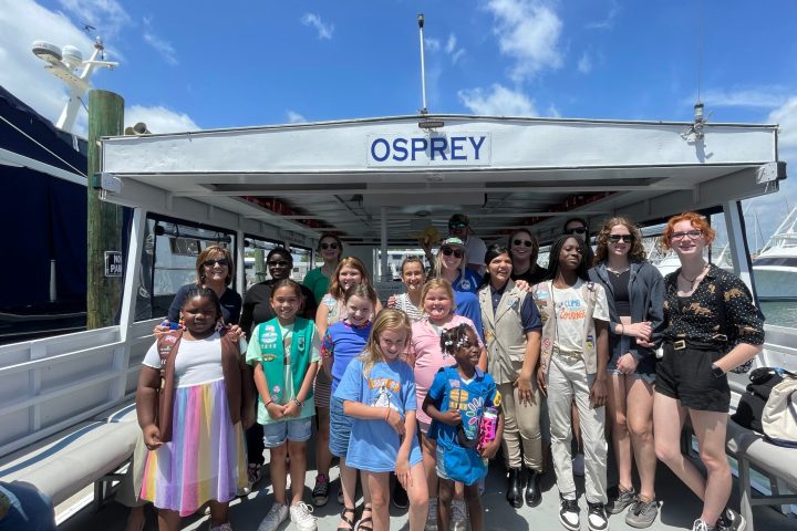 a group of people posing for the camera