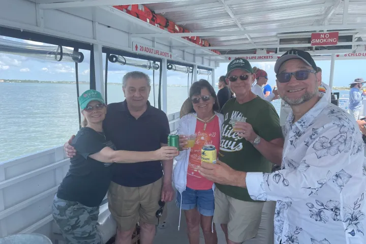 a group of people posing for the camera