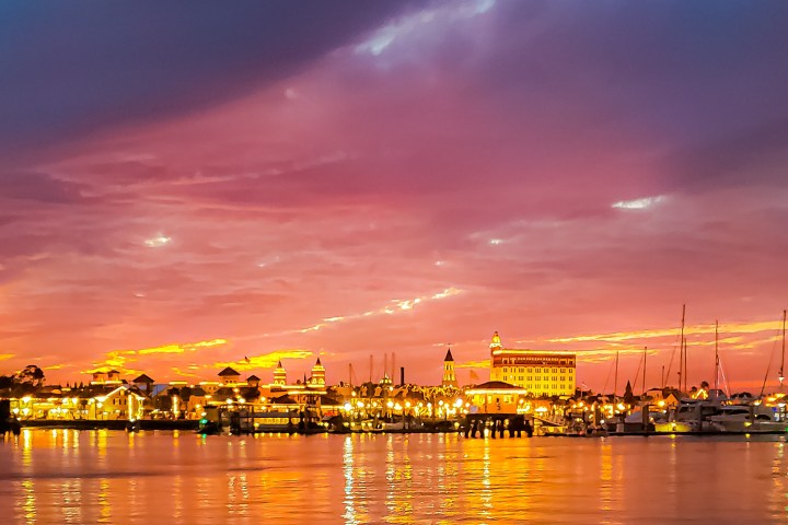 a sunset over a body of water