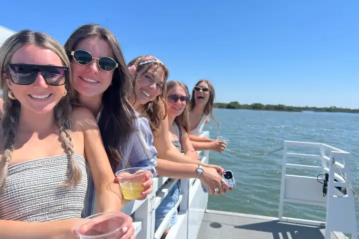 a couple of people that are standing in the water