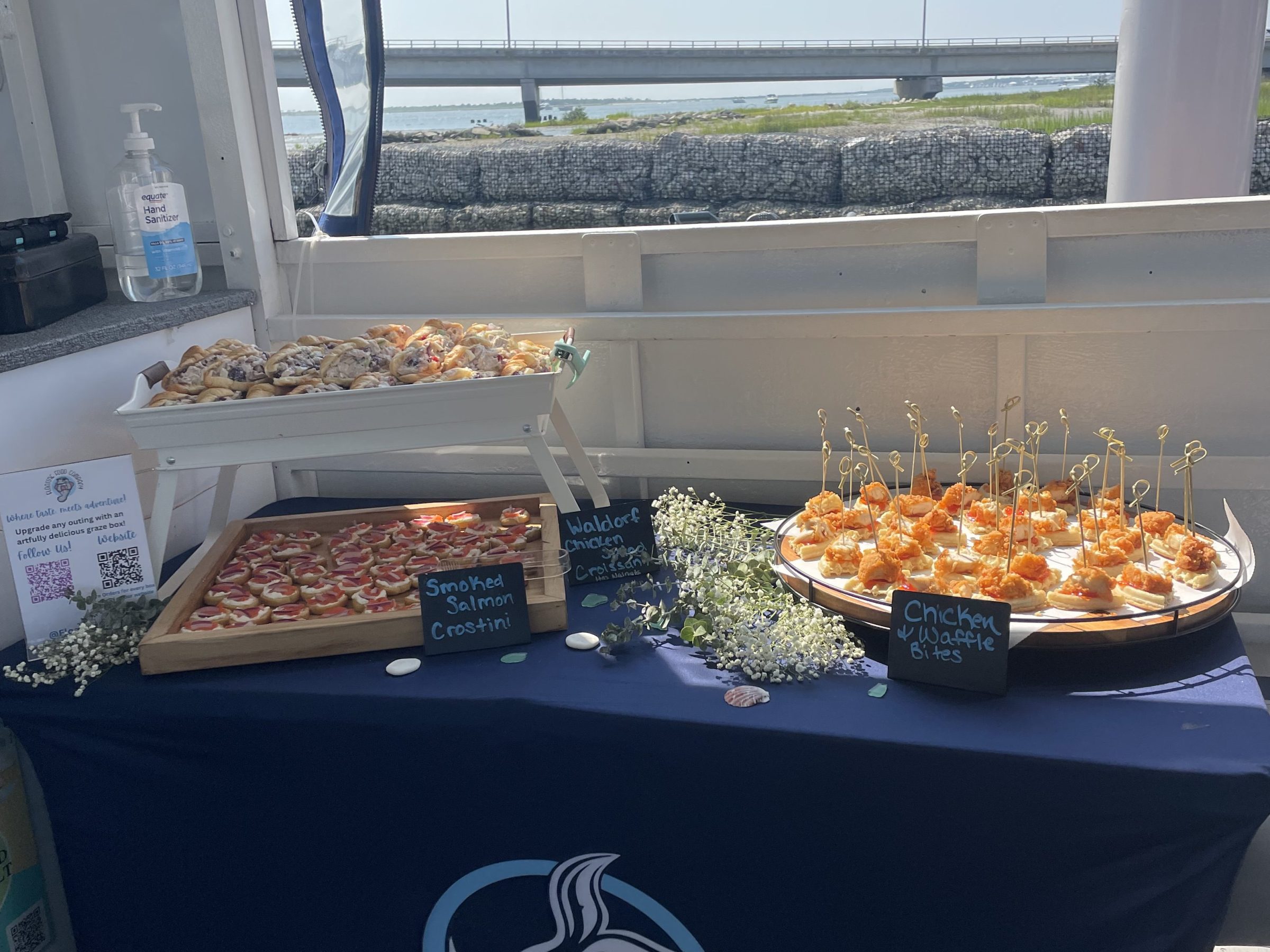 a close up of food on a table next to a window