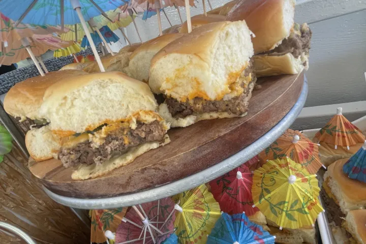 a cut in half sandwich sitting on top of a table