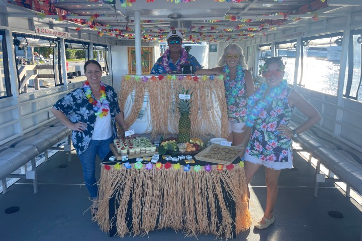 a group of people standing in front of a building