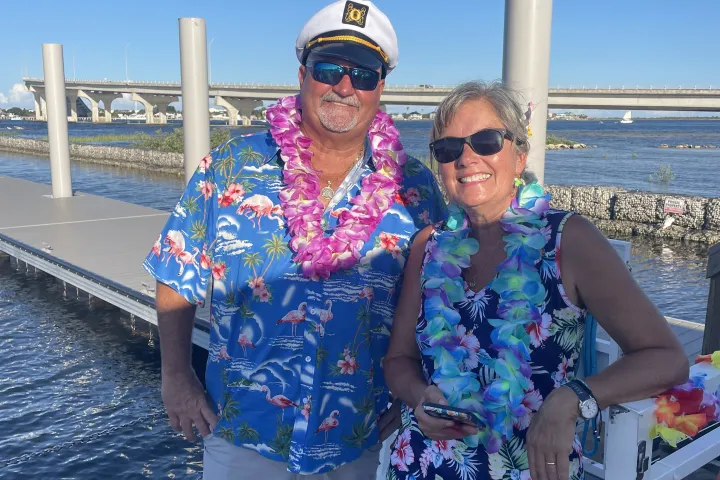 a group of people standing on a bridge