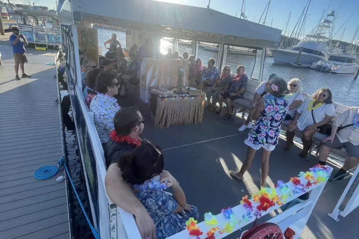 a group of people standing on top of a ramp