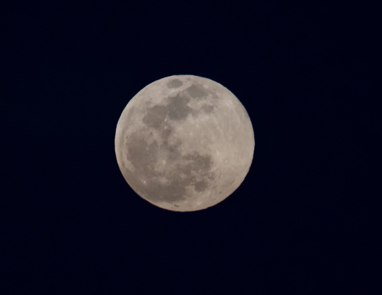 a close up of the moon in the dark