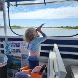 a person sitting on a boat