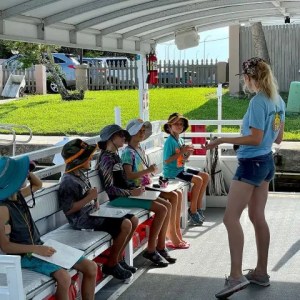 a group of people sitting on a bench