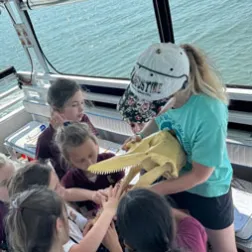 a group of people on a boat