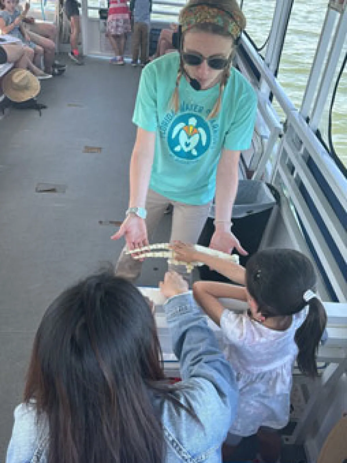 a group of people around each other