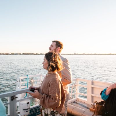 a person standing in front of a body of water