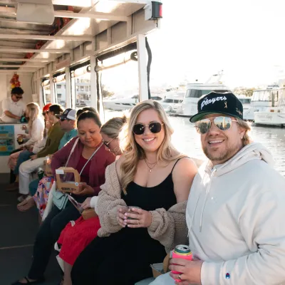 a group of people sitting posing for the camera