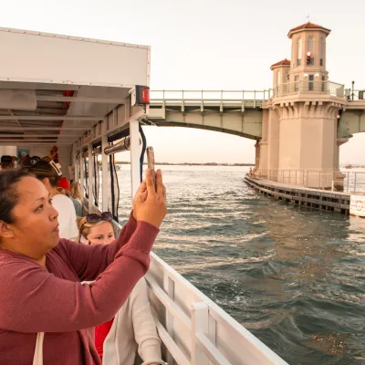 a person standing in front of a body of water