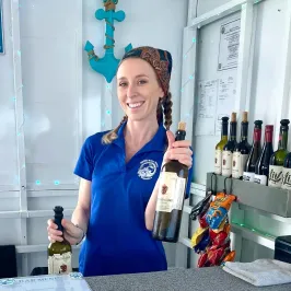 a person holding a bottle