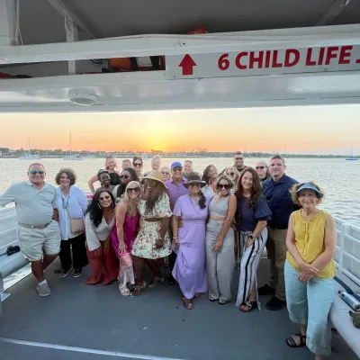 a group of people posing for the camera