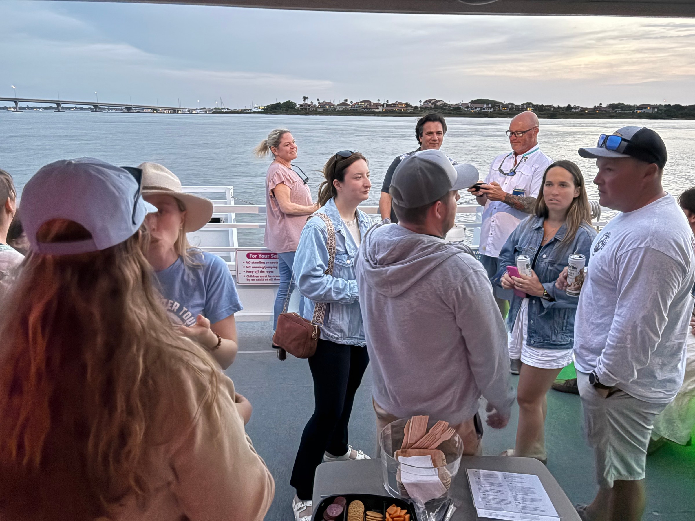 a group of people that are standing in the water