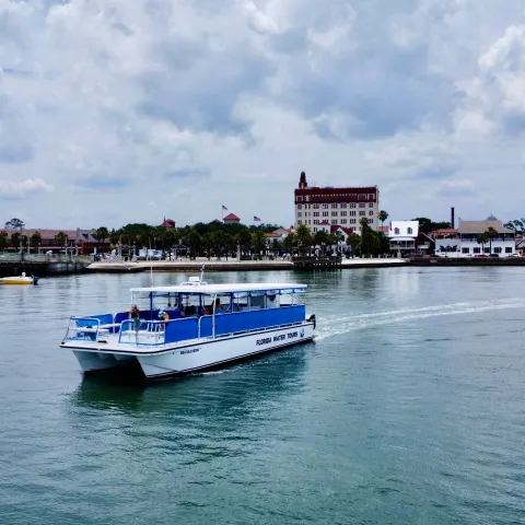 a small boat in a large body of water